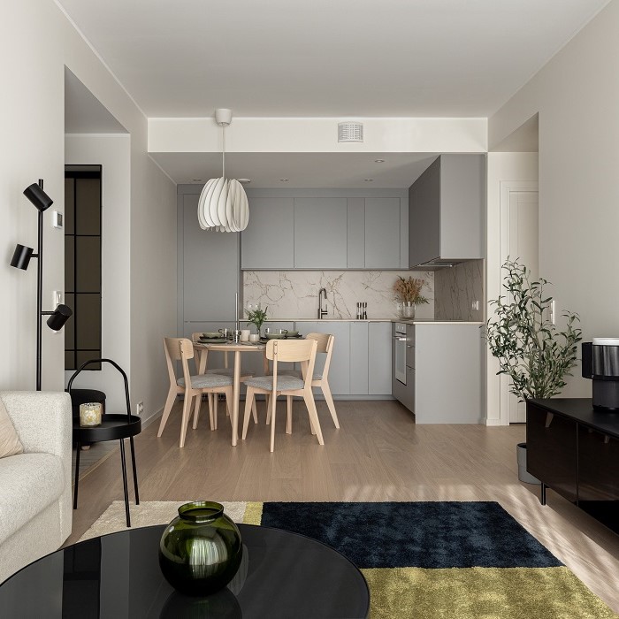 A white kitchen with a text: more business projects and testimonials.