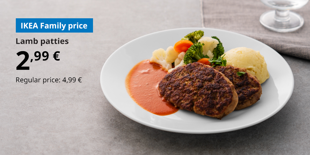 Lamb patties served with mashed potatoes, sauce, and vegetables on a white plate, placed on a grey countertop. In the top left corner, the IKEA Family price of 2,99 € is shown, with the regular price of 4,99 €.