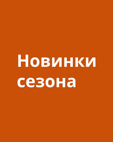 Серо-зелёный каркас кушетки HEMNES с тремя ящиками стоит у жёлтой стены. На нём разложены несколько ярких подушек.