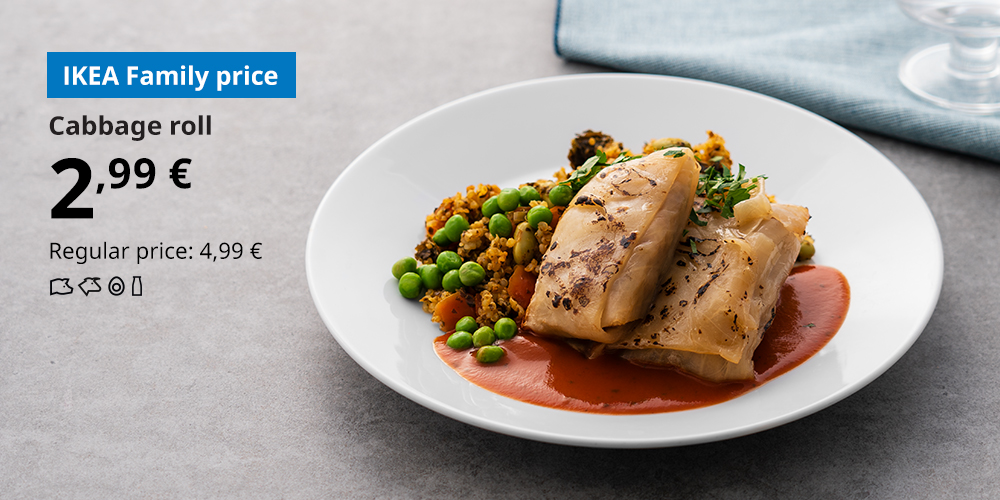 Cabbage rolls served with quinoa, sauce, and vegetables on a white plate, placed on a grey countertop. In the top left corner, the IKEA Family price of 2,99 € is shown, with the regular price of 4,99 €.